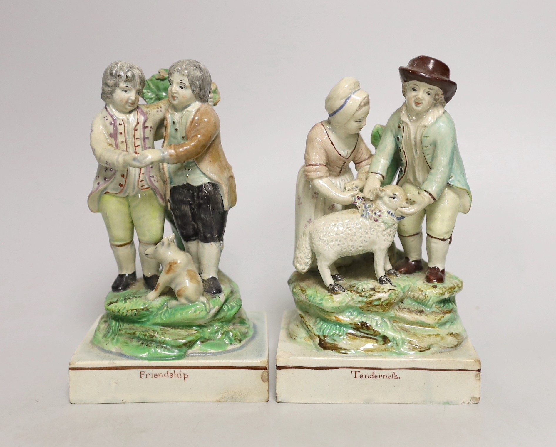 A pair of Ralph Wood pearlware groups Friendship and Tenderness, late 18th century, friendship with impressed number 154 to the back of the base, 16cm